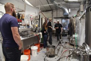 WSU Tri-Cities student veterans work with Bombing Range Brewing Company to brew a beer that would be sold a few weeks later through the company