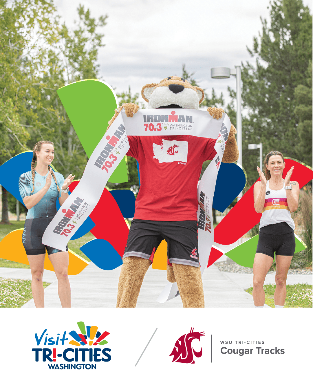 Cougar Tracks IRONMAN 1080x1350 Butch mascot holding an IRONMAN 70.3 Washington Tri-Cities ribbon across a paved pathway with two athletes applaud on either side. Beneath the image are the Visit Tri-Cities Washington logo and the WSU Tri-Cities Cougar Tracks logo.