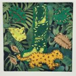 Textile fabric leaves, letter J, and stitched jaguar.