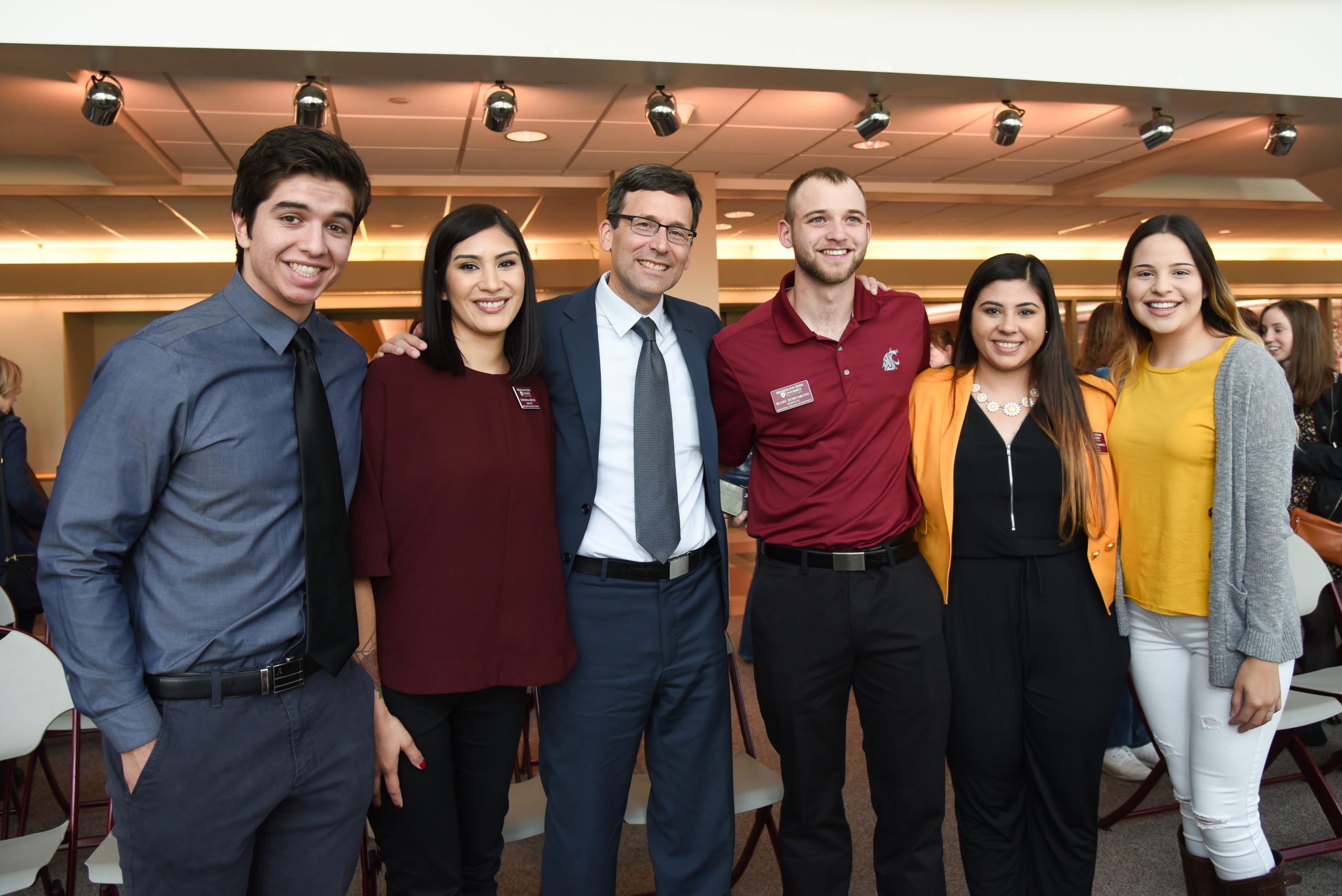 Savanna Kresse posing for a photo with other student leaders