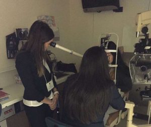 Yepez and friends in an eye exam room