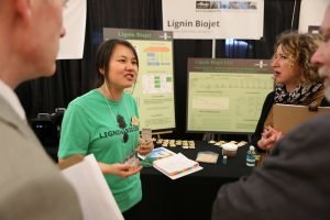 Libing Zhang presents during the UW Business Plan Competition