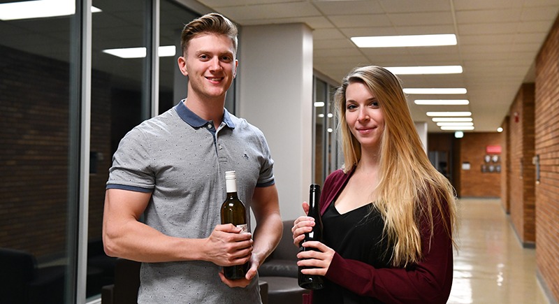 Wine business competition award winners - WSU Tri-Cities students Kyle Brunson and Danae Williams