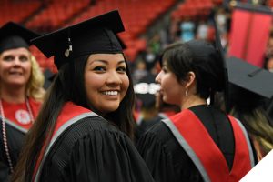 Smiling female student at graduation